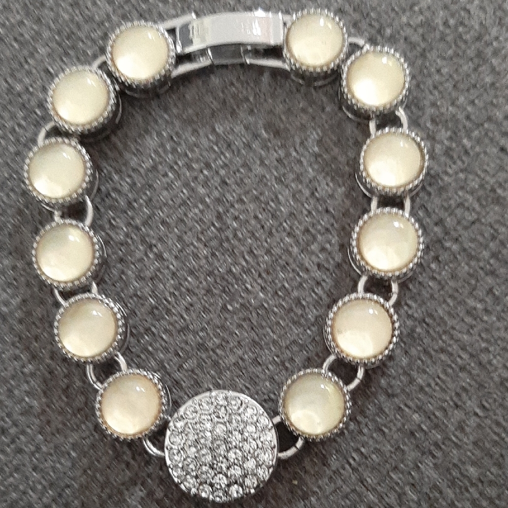 Elegant Silver and Cream Bracelet.LIA SOPHIA